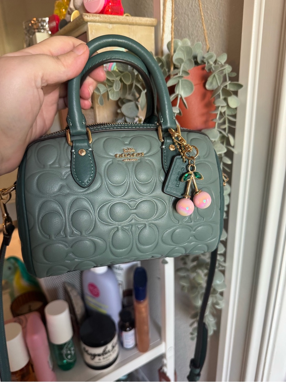 Coach Teal Embossed Mini Rowan - Charm not included
